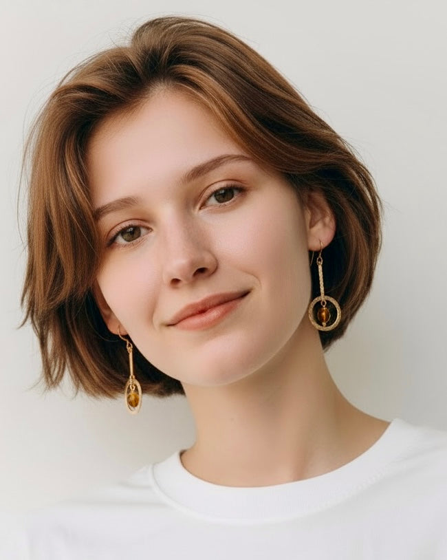 Copper-Art Deco-inspired earrings with a faceted amber crystal bead